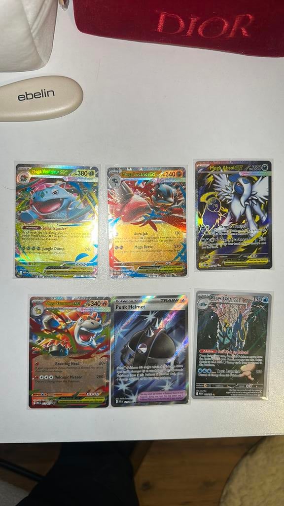 Mega Evolution hits, Ophalen of Verzenden, Zo goed als nieuw, Meerdere kaarten