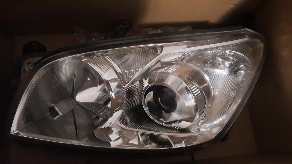 Toyota RAV4 linker koplamp 2009, Ophalen of Verzenden, Nieuw, Toyota