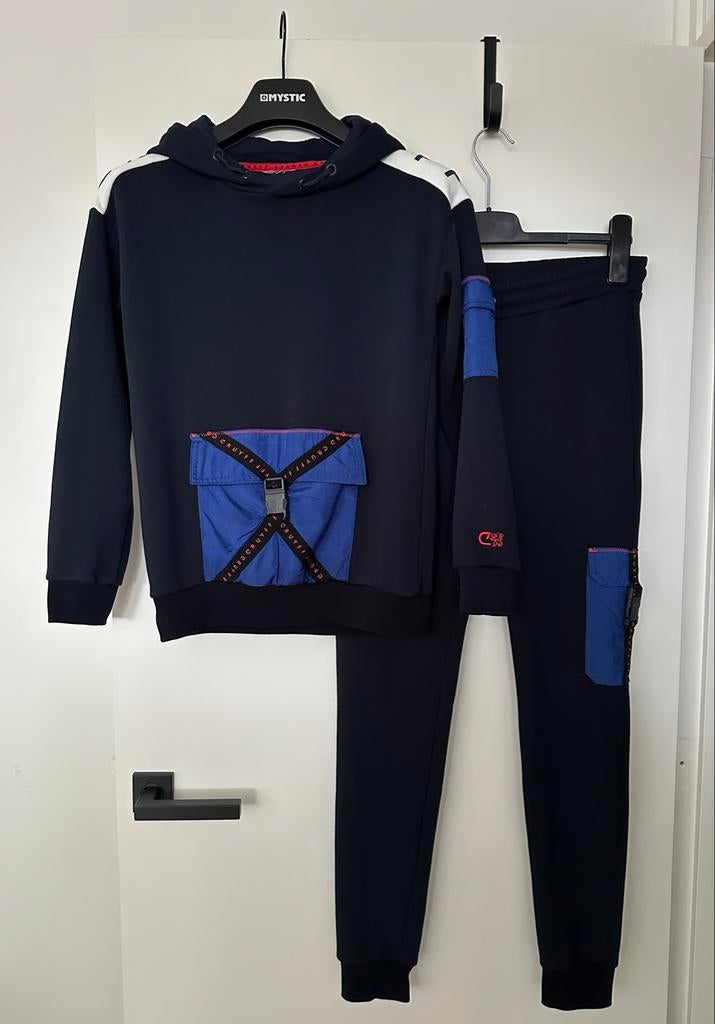 Cruyff - Clipper Hooded Trainingspak blauw | maat 164, Kinderen en Baby's, Kinderkleding | Maat 164, Ophalen of Verzenden, Zo goed als nieuw