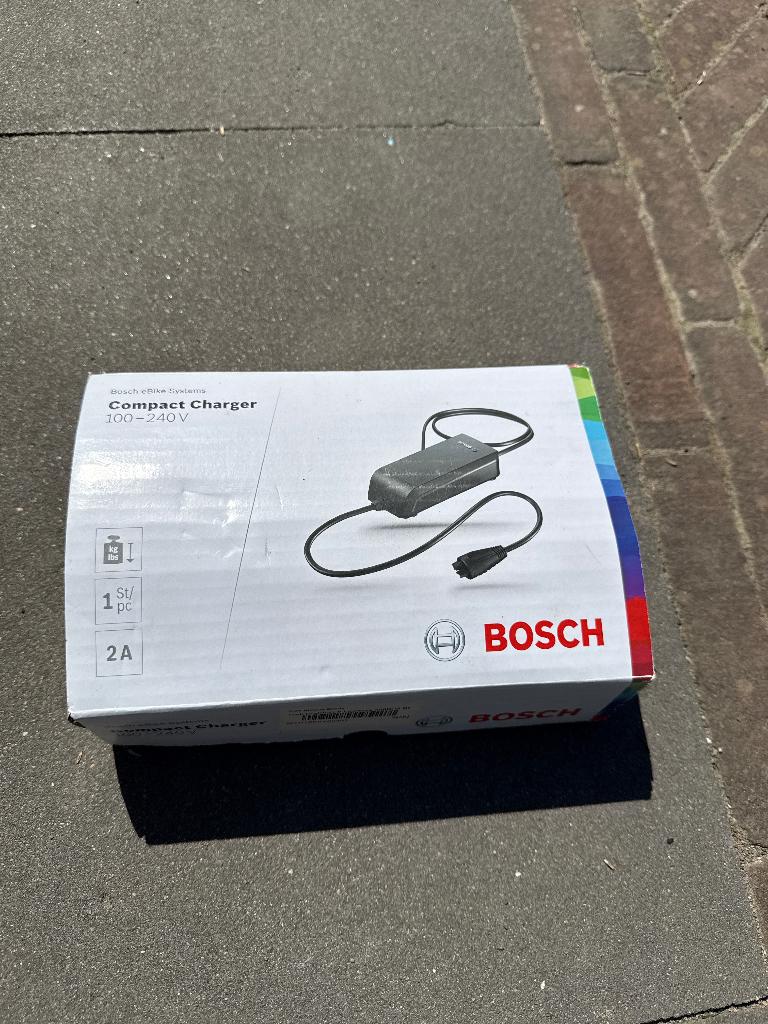 Nieuw in doos - Bosch compact charger 100-240v, Ophalen, Nieuw