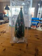 Kerstboom verlicht kerstdorp, Ophalen