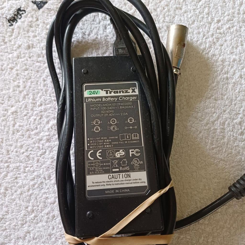 Tranz X 24V Lithium Batterijlader (Model MDA10129402000), Fietsen en Brommers, Fietsaccessoires | Fietsaccu's, Ophalen of Verzenden