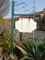 Zeer leuke tuin naambord, Ophalen