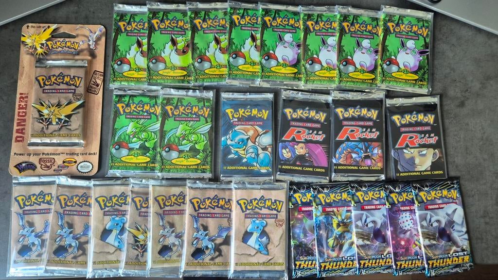 Booster packs, Base Set, Jungle, Rocket, Fossil, Lost Thunde, Ophalen of Verzenden, Zo goed als nieuw, Booster