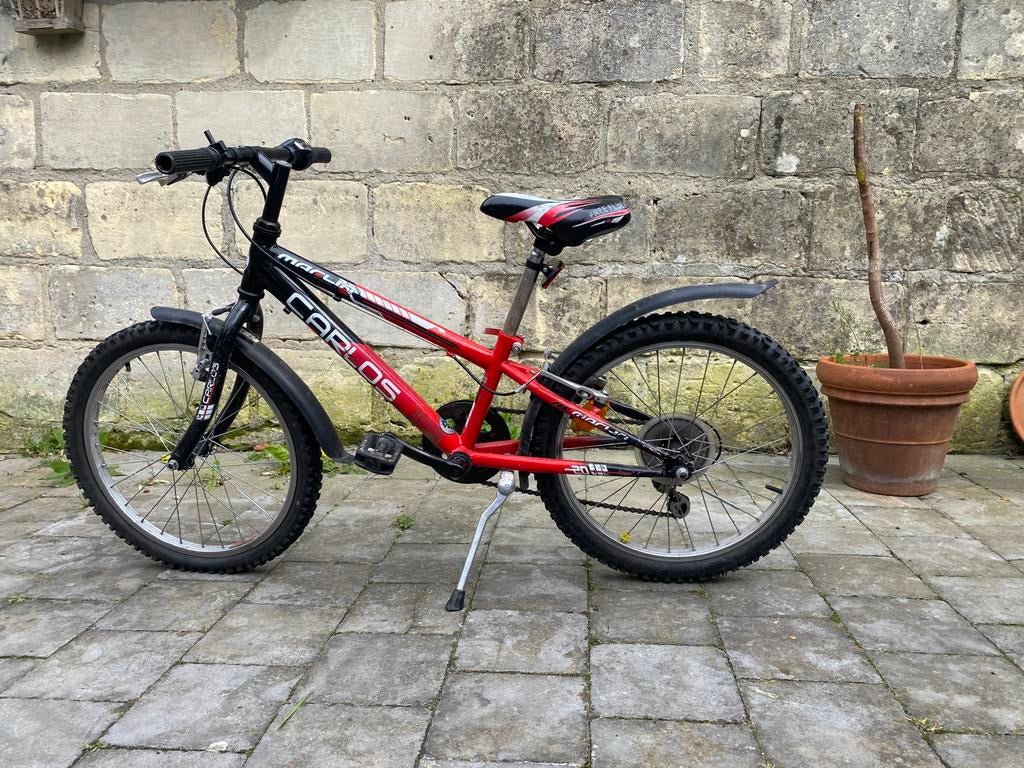 Carlos rood-zwarte mountainbike voor kind zes versnellingen, Ophalen, Staal, Voetsteunen, 16 tot 20 inch