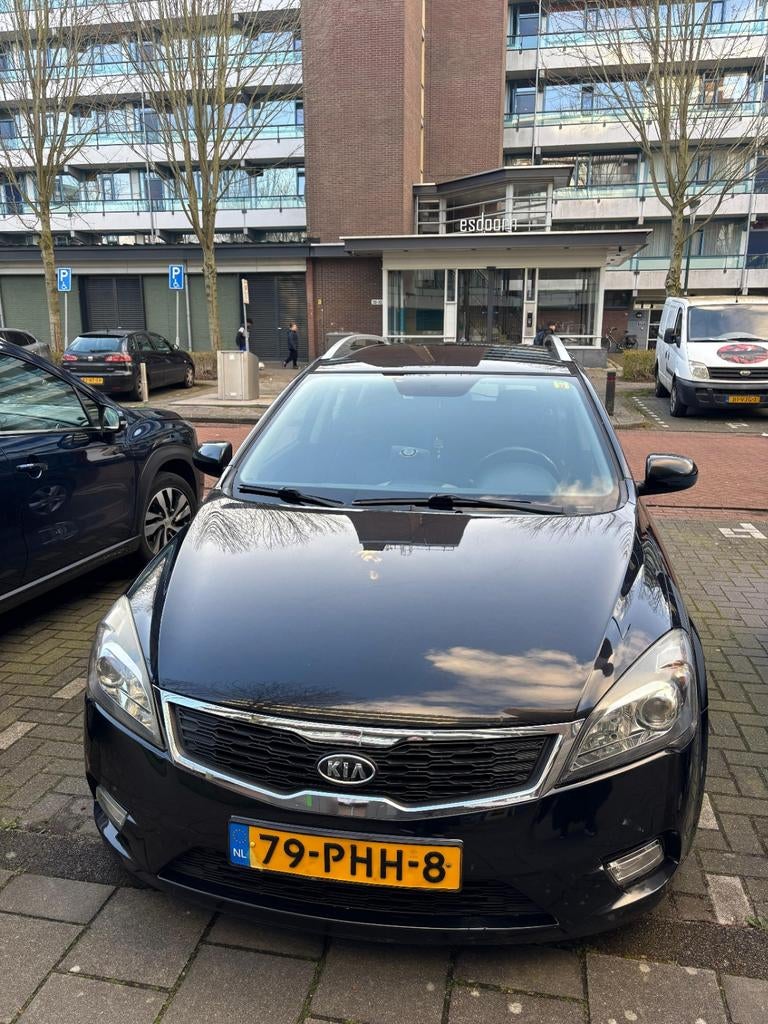 Kia (Pro) Cee d 1.4 Cvvt Sporty Wagon 2011 Zwart, Auto's, Kia, Voorwielaandrijving, Stof, 4 cilinders, 1396 cc