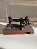 Naaimachine Frisia, Ophalen