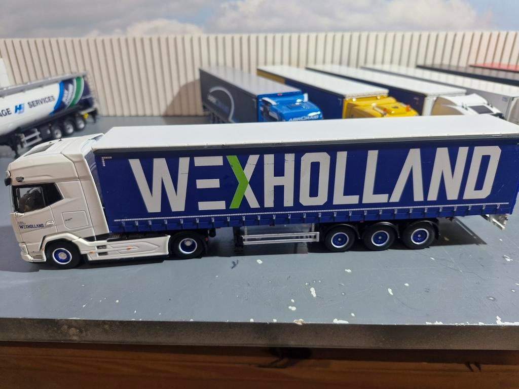 Daf XG + met huiftrailer wsi van  WEXHOLLAND, Hobby en Vrije tijd, Modelauto's | 1:50, Ophalen of Verzenden, Zo goed als nieuw