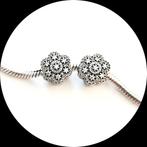 Pandora Bloem zirkonia 791998CZ / retired, Pandora, Ophalen of Verzenden, Zo goed als nieuw, 2 of 3 bedels