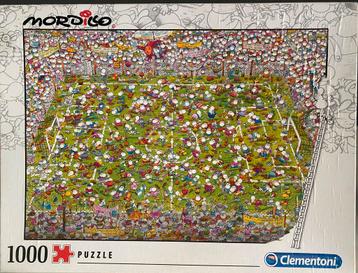 Clementoni Puzzel The Match Mordillo 1000 stukjes beschikbaar voor biedingen
