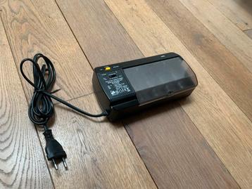 Universele Batterijlader incl batterijen beschikbaar voor biedingen