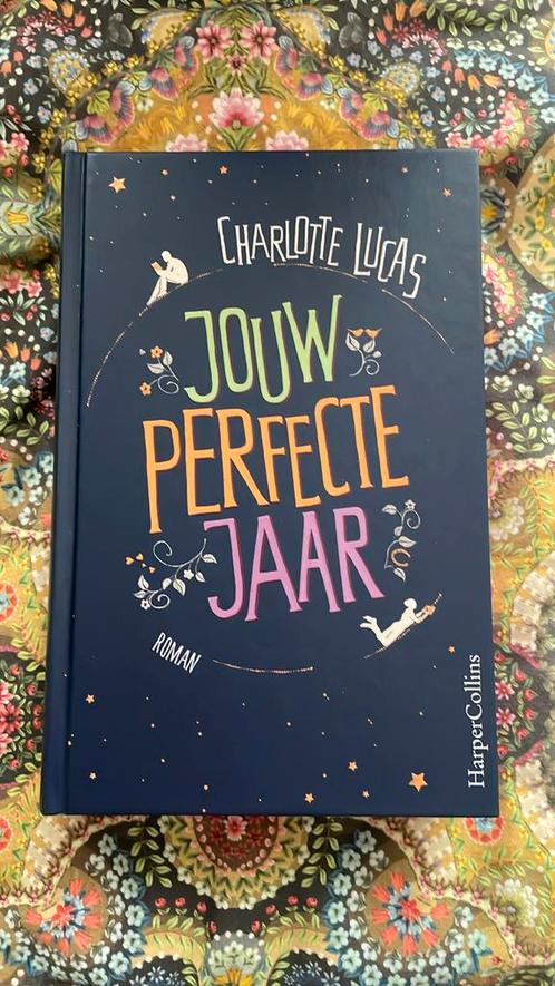 Charlotte Lucas - Jouw perfecte jaar, Boeken, Literatuur, Zo goed als nieuw, Nederland, Ophalen of Verzenden