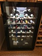 Wijnkoelkast Haier - 33 flessen, Ophalen, Zonder vriesvak, Minder dan 85 cm, 45 tot 60 cm