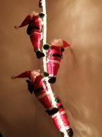 Klimmende kerstmannen 4 stuks op lichtslang ongeveer 90 cm, Diversen, Kerst, Ophalen of Verzenden, Zo goed als nieuw