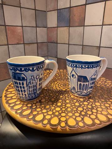 Blond Amsterdam,2 mokken,als nieuw,hoog 11 cm,doorsnee 9.5cm beschikbaar voor biedingen