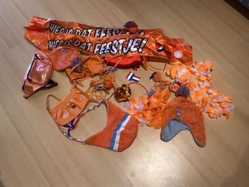 Oranje spulletjespakket beschikbaar voor biedingen