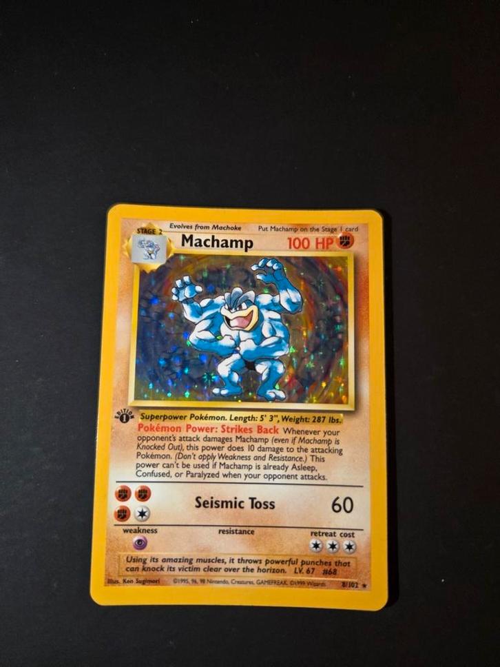 Machamp 8/102 Pokemon Base set holo 1st edition, Hobby en Vrije tijd, Verzamelkaartspellen | Pokémon, Zo goed als nieuw, Booster