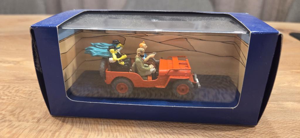 Kuifje auto - De rode jeep uit 'Kuifje en het zwarte goud', Verzamelen, Ophalen of Verzenden, Kuifje, Nieuw, Beeldje of Figuurtje