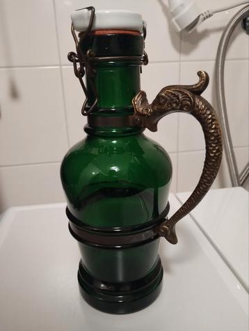 Vintage Herrenhauser fles met brons handvat beschikbaar voor biedingen