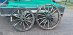 2 oude wagenwielen, Ophalen