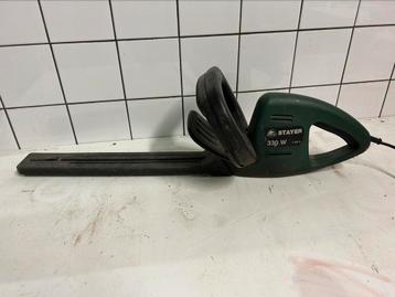Nette heggenschaar beschikbaar voor biedingen