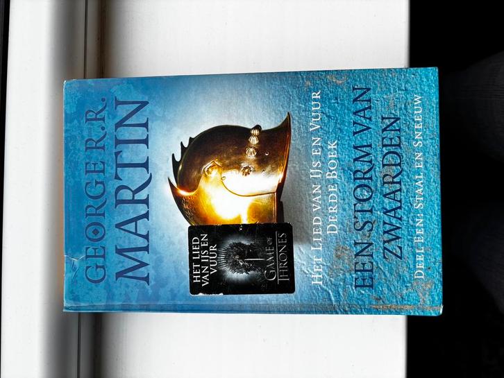 George R.R. Martin - A Staal en sneeuw, Boeken, Fantasy, Zo goed als nieuw, Ophalen of Verzenden