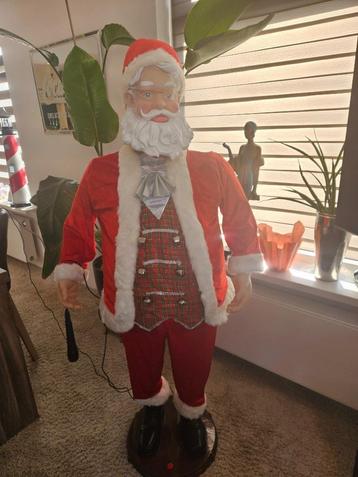 Kerstman met microfoon en zingt en danst zelf ook echt.  !!! beschikbaar voor biedingen