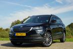 Skoda Karoq 1.0 TSI Ambition Business Automaat - Magic Black, Auto's, Skoda, 65 €/maand, Stof, Gebruikt, 1261 kg