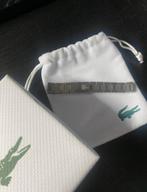 Lacoste Armband - Stijlvol Accessoire, Sieraden, Tassen en Uiterlijk, Armbanden, Ophalen of Verzenden, Nieuw, Zilver, Staal