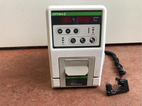 Universele infuuspomp Optima 2+paalklem+druppelteller, Diversen, Braces, Gebruikt, Ophalen of Verzenden