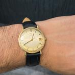 18k Omega Gouden heren horloge 1961, Ophalen of Verzenden, Zo goed als nieuw, Goud