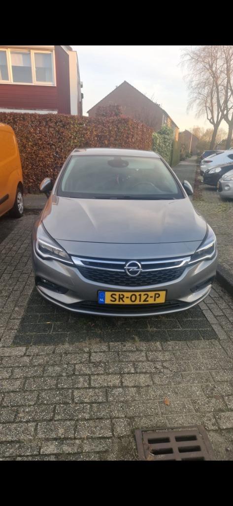 Opel Astra 1.4 Turbo 150pk Start/stop 2017 Grijs, Auto's, Opel, Particulier, Astra, 4x4, ABS, Achteruitrijcamera, Adaptieve lichten