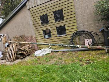 Vlaggenmast van oude lantaarnpaal beschikbaar voor biedingen