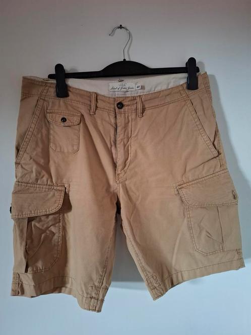 Beige of kaki korte broek. H&M LOGG. Maat 34. Taillemaat: 92, Kleding | Heren, Broeken en Pantalons, Zo goed als nieuw, Beige