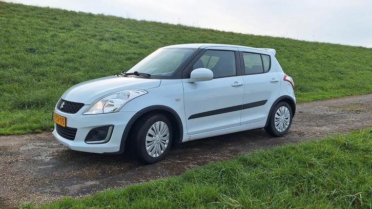 Suzuki Swift 1.2 comfort EASSS, Auto's, Suzuki, Particulier, Swift, Benzine, Euro 5, Handgeschakeld, Wit, Grijs, Stof, Voorwielaandrijving