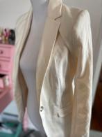 Witte getailleerde blazer, Ophalen