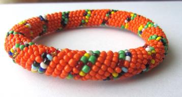 Prachtige ORANJE zaad kraal handgemaakte gehaakte armband beschikbaar voor biedingen
