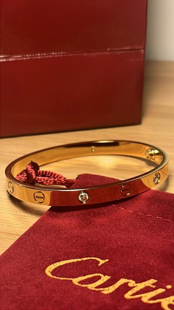 Cartier love armband, Sieraden, Tassen en Uiterlijk, Armbanden, Zo goed als nieuw, Goud, Ophalen of Verzenden