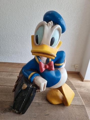 Donald Duck met koffer beschikbaar voor biedingen