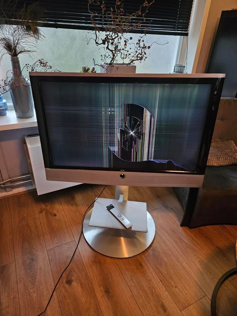 Loewe tv-poot/tafel RVS, Ophalen