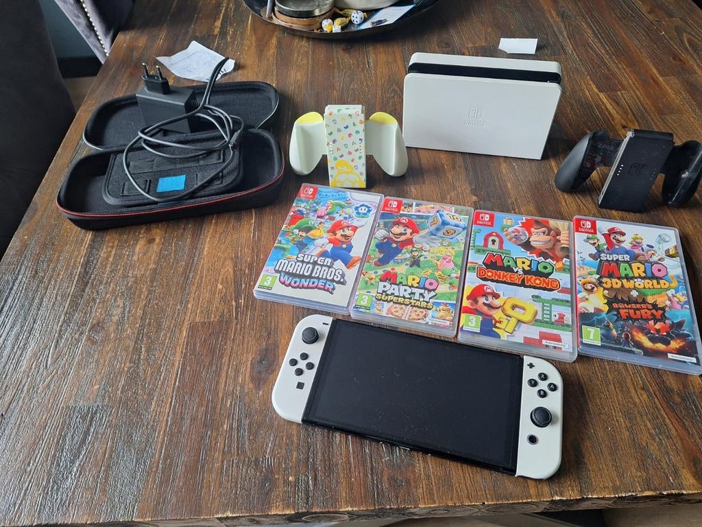 Nintendo Switch OLED met 4 Mario games, Ophalen of Verzenden