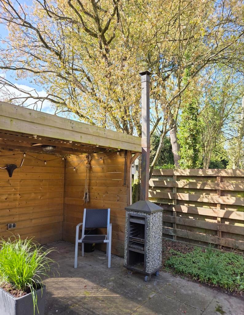 Mooie buitenhaard/tuinhaard verrijdbaar met houtopslag, Ophalen, Gebruikt