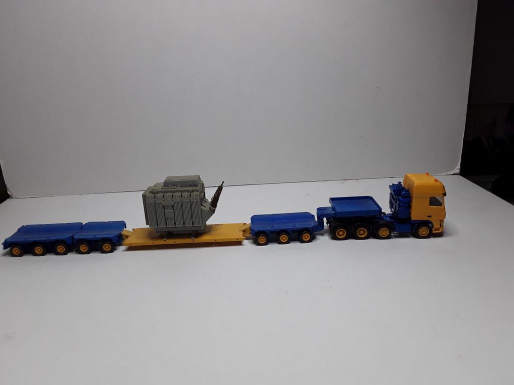 HERPA  DAF XF 105 SSC  MET KIBRI Scheuerle dieplader, Hobby en Vrije tijd, Modelauto's | 1:87, Ophalen of Verzenden, Zo goed als nieuw