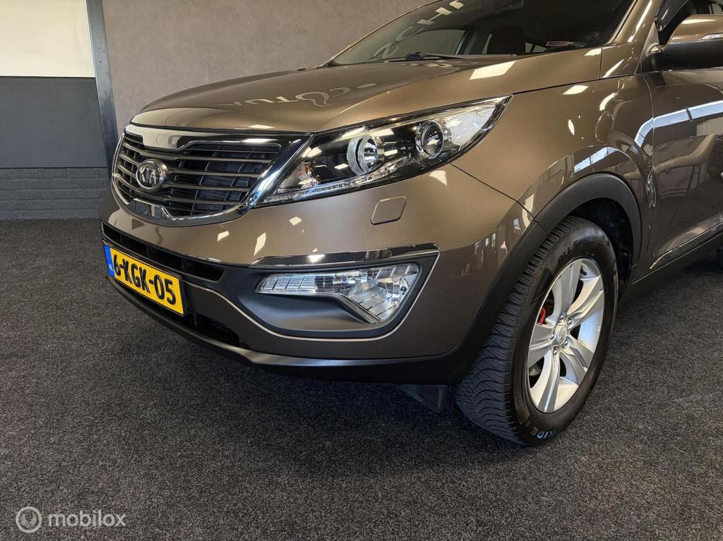 Kia Sportage 2.0 X-tra TR.HAAK / CAMERA / CARPLAY / PDC / LM, Auto's, Stof, Gebruikt, Zwart, 4 cilinders