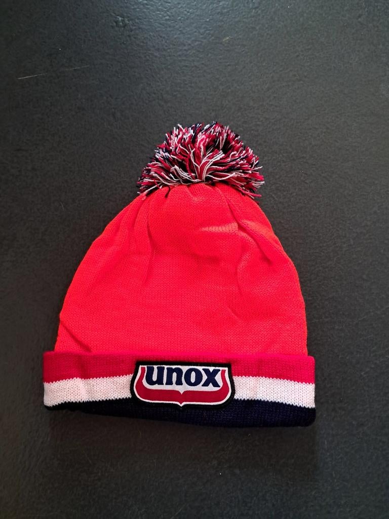 Unox muts pompom nieuw, Ophalen of Verzenden, Nieuw, Pet of Muts