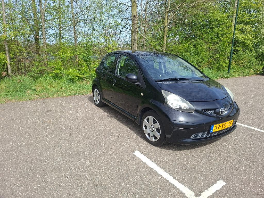 Toyota Aygo 1.0 12V Vvt-i 5DRS 2007 Zwart, Auto's, Toyota, Voorwielaandrijving, Stof, 4 stoelen, Origineel Nederlands