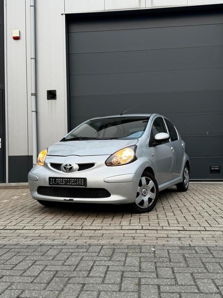 Toyota Aygo 1.0 12V Vvt-i 5DRS 2006 Grijs, Auto's, Toyota, Bedrijf, Aygo, Airbags, Airconditioning, Alarm, Centrale vergrendeling