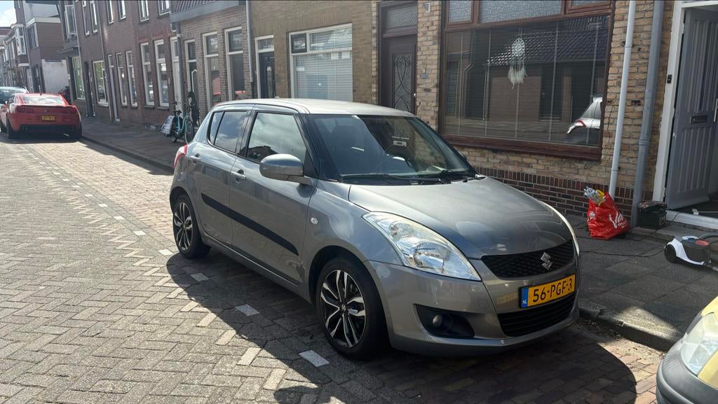 Suzuki Swift 1.2 5-D 2011 Grijs, Auto's, Suzuki, Voorwielaandrijving, Stof, 4 cilinders, 400 kg