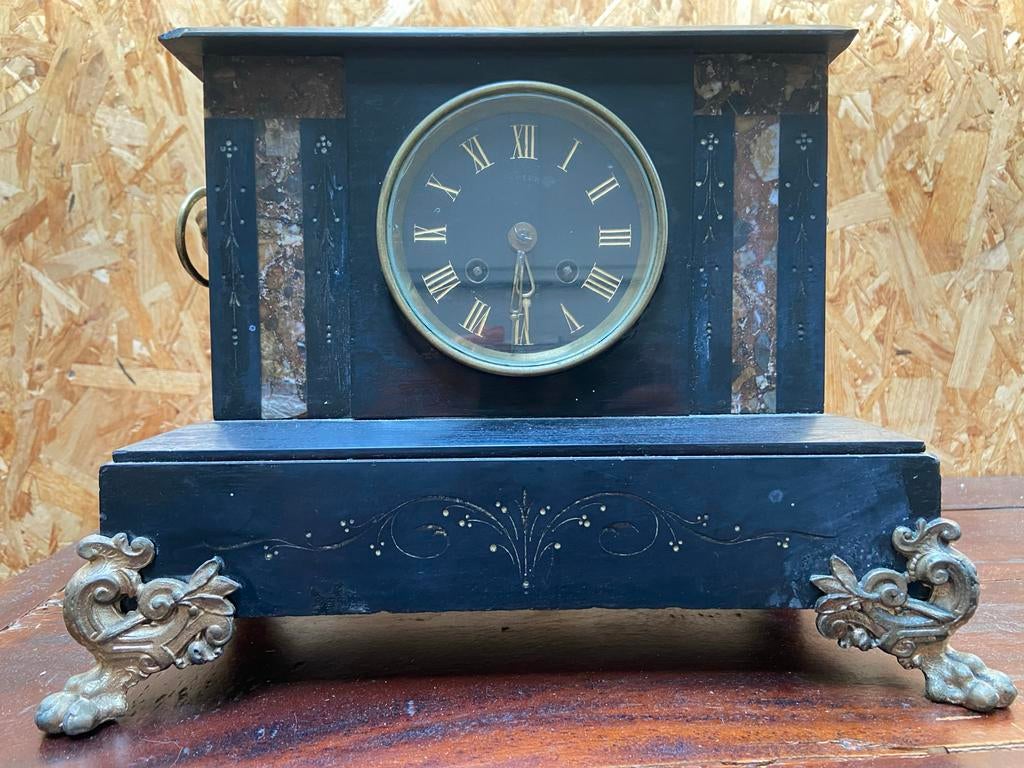 Antieke schoorsteenklok, Ophalen