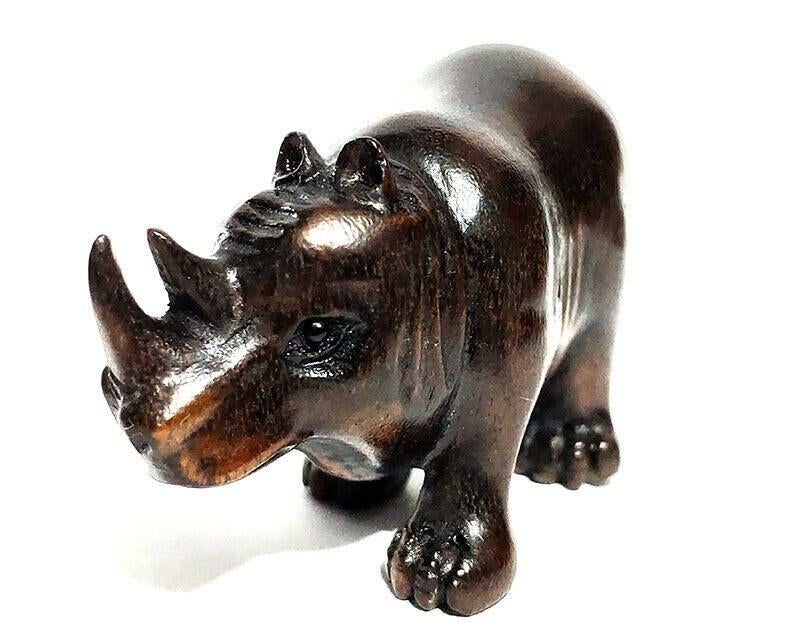 Ironwood Netsuke van een neushoorn late Meiji periode, Ophalen of Verzenden